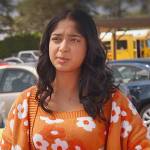 Devi’s orange floral top and cardigan set on Never Have I Ever