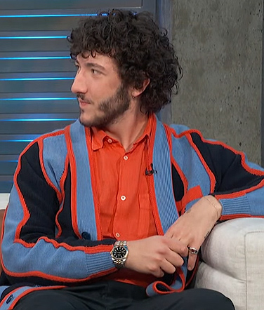 Franklin Jonas’s blue stripe cardigan on Access Hollywood