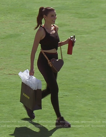 Heather’s black leggings and heart bag on The Real Housewives of Orange County