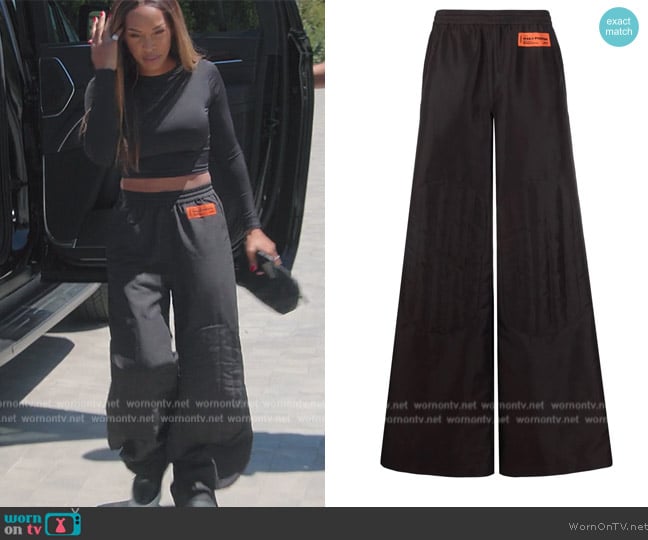 Logo-patch wide-leg trousers jby Heron Preston worn by (Malika Haqq) on The Kardashians