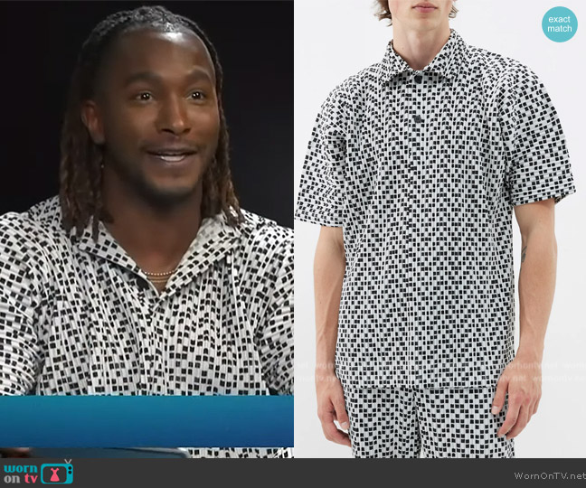 Homme Plisse Issey Miyake Geometric-print technical-pleated polo shirt worn by Scott Evans on Access Hollywood