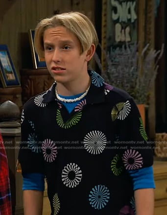 Jake’s black disc print polo shirt on Bunkd