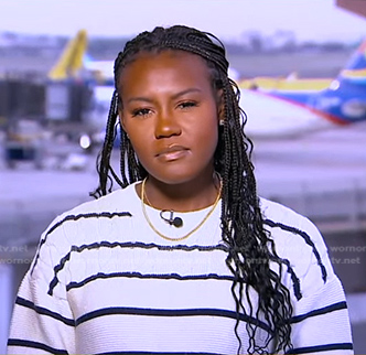 Janai’s white striped knit sweater on Good Morning America