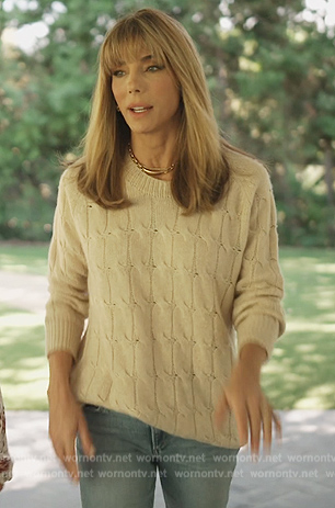Jennifer’s white cable knit sweater on The Family Stallone