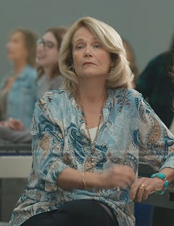 Karen’s blue paisley print top on Manifest