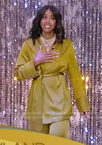 Kelly Rowland’s yellow wrap jacket and pants on Tamron Hall Show
