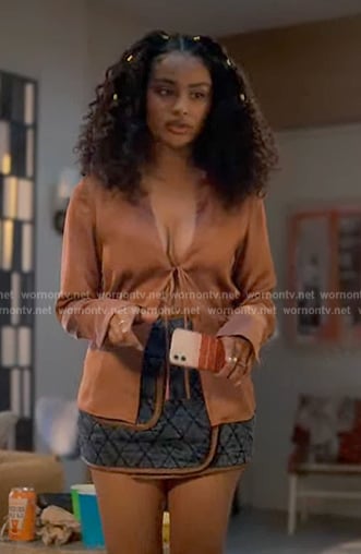 Kiela’s satin tie front top and denim mini skirt on Grown-ish