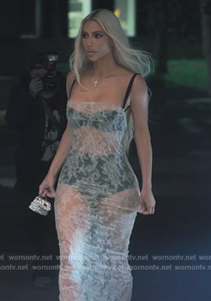 Kim’s white sheer lace dress on The Kardashians