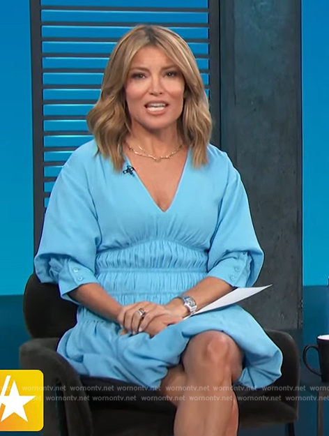 Kit’s blue smocked waist mini dress on Access Hollywood