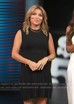 Kit’s navy pleated dress on Access Hollywood