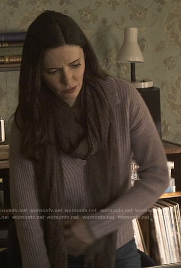 Lois’s purple polo sweater on Superman and Lois