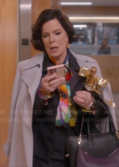 Margaret’s light blue coat on So Help Me Todd