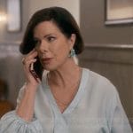 Margaret’s light blue v-neck blouse on So Help Me Todd