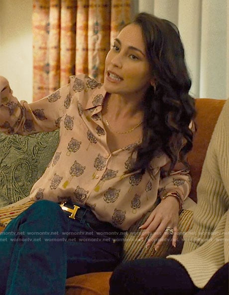 Ruby’s pink tiger head print blouse on Based on a True Story