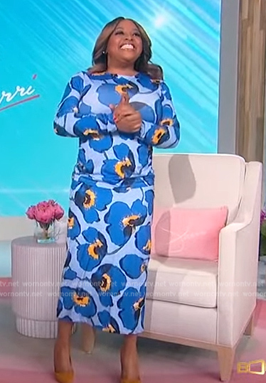 Sherri’s blue floral print top and skirt on Sherri