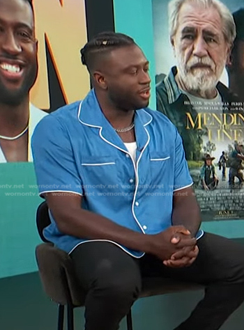 Sinqua Walls’s blue shirt with white piping on Access Hollywood