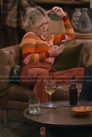 Sophie’s orange striped polo top on How I Met Your Father