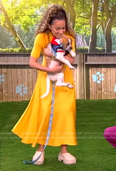 Sunny’s yellow mixed media flared dress on The View