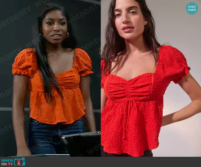 Urban Outfitters Beverly Textured Lace-Up Babydoll Blouse in Red worn by Trina Robinson (Tabyana Ali) on General Hospital