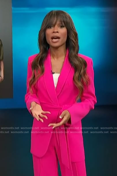 Zuri’s pink belted blazer on Access Hollywood