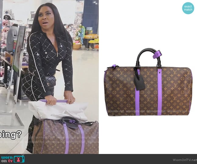 Louis Vuitton Keepall cloth travel bag worn by Kenya Moore on The Real Housewives of Atlanta