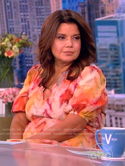 Ana’s orange abstract print short sleeve dress on The View