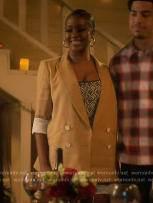 Annika’s yellow pinstripe blazer and corset top on Grown-ish