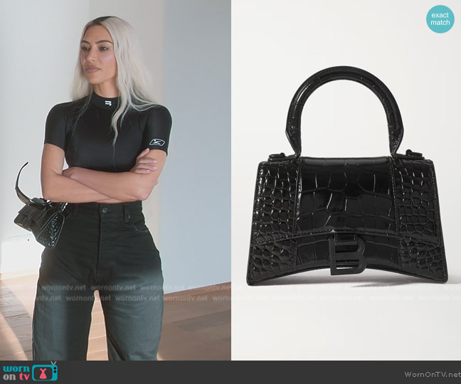 Balenciaga Hourglass XS croc-effect leather tote worn by Kim Kardashian (Kim Kardashian) on The Kardashians