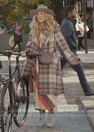 Carrie’s plaid coat and stripe dress on And Just Like That