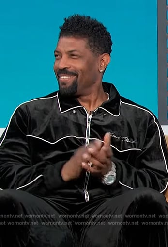 Deon Cole’s black velvet jacket on Access Hollywood
