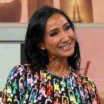 Elizabeth Werner’s rainbow face print sweater on CBS Mornings