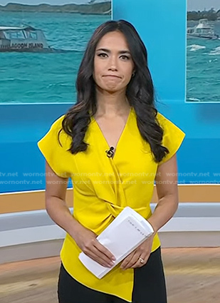 Emilie Ikeda’s yellow twist short sleeve top on Today