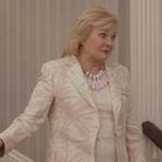 Enid’s beige palm print blazer on And Just Like That