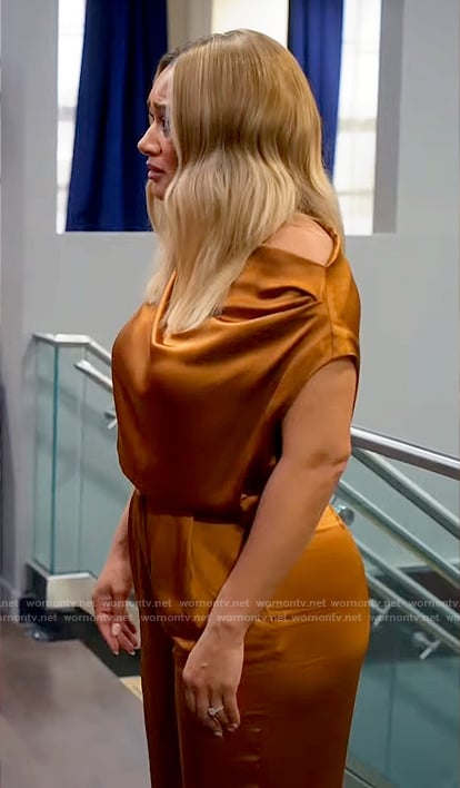 Fatima’s orange satin draped top and pants on Tyler Perrys Sistas