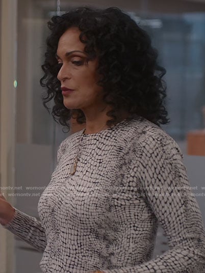 Francey’s white crocodile print sweater on So Help Me Todd