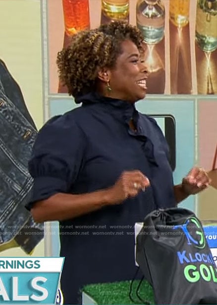 Gayle Bass’ navy ruffled dress on CBS Mornings