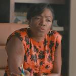 Helen’s orange floral print sleeveless top on Sweet Magnolias