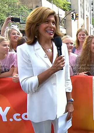 Hoda’s white ruched sleeve blazer and front slit pants on Today