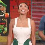 Jeannie Mai’s green stripe pants on Access Hollywood