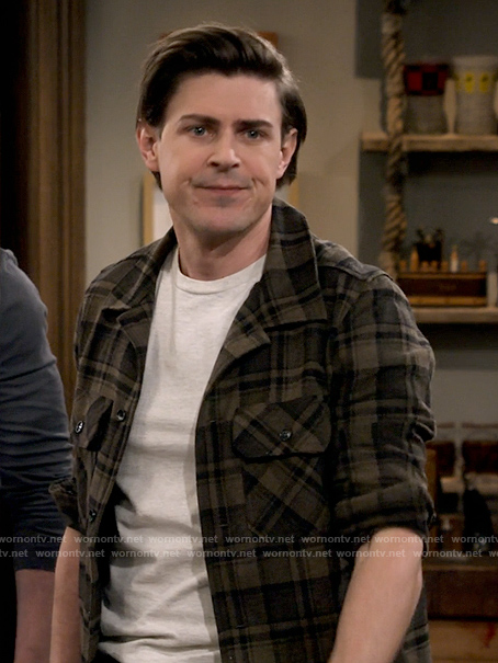 Jesse’s brown plaid shirt on How I Met Your Father