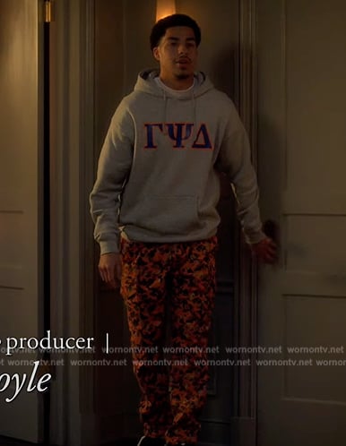 Junior’s orange camo print pants on Grown-ish