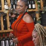 Kandi’s red lace-up dress on The Real Housewives of Atlanta