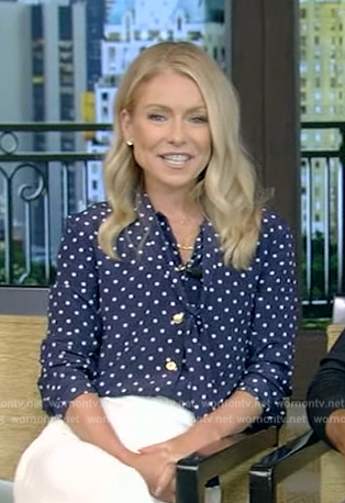 Kelly’s blue polka dot tie neck blouse on Live with Kelly and Mark