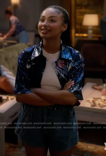 Kiela’s blue metallic short sleeve top on Grown-ish