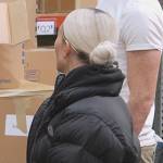 Kim’s black puffer jacket on The Kardashians