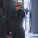 Kim’s black mesh gloved top on The Kardashians