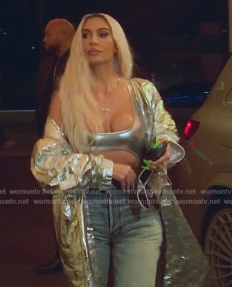 Kim’s silver metallic swimsuit and coat on The Kardashians
