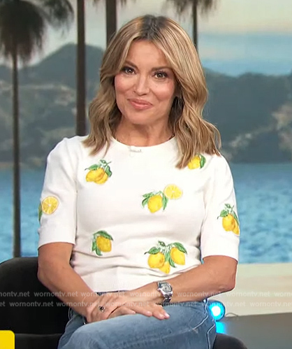 Kit’s white lemon sweater on Access Hollywood