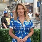 Kit’s blue floral print romper on Access Hollywood