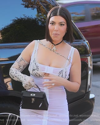 Kourtney’s black leather mini bag on The Kardashians